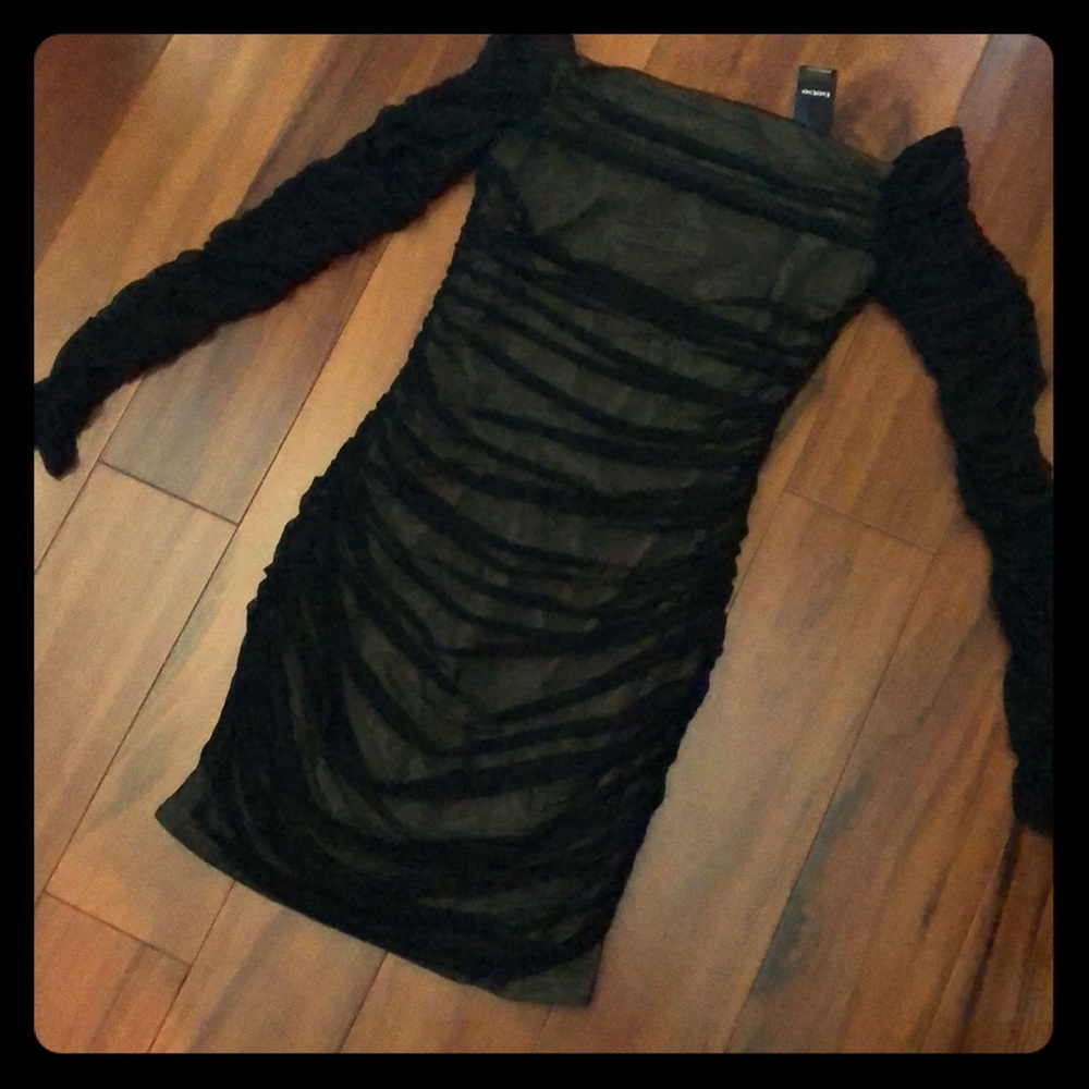 Off shoulder mesh dress.